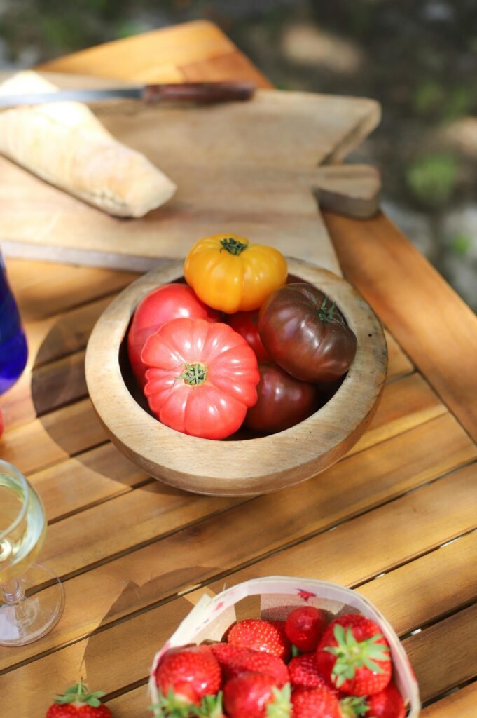 tomatoes in wooden bowl