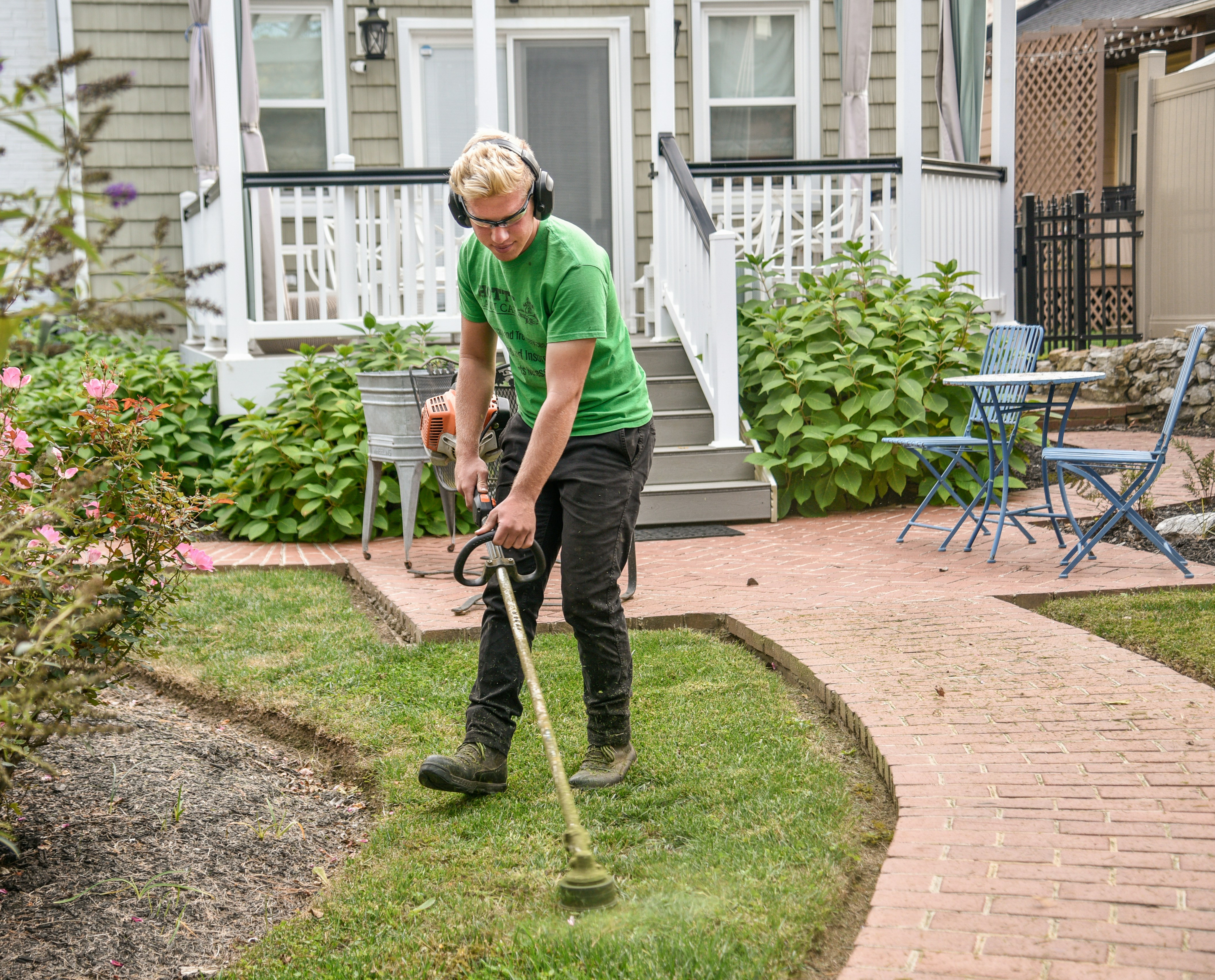 A man taking care of lawn